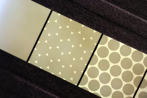 Warp & Weft by Brian Black; Computer-generated animation, recorded onto motion picture film. Then, printed film is laid out and mounted onto a custom-built light box for display