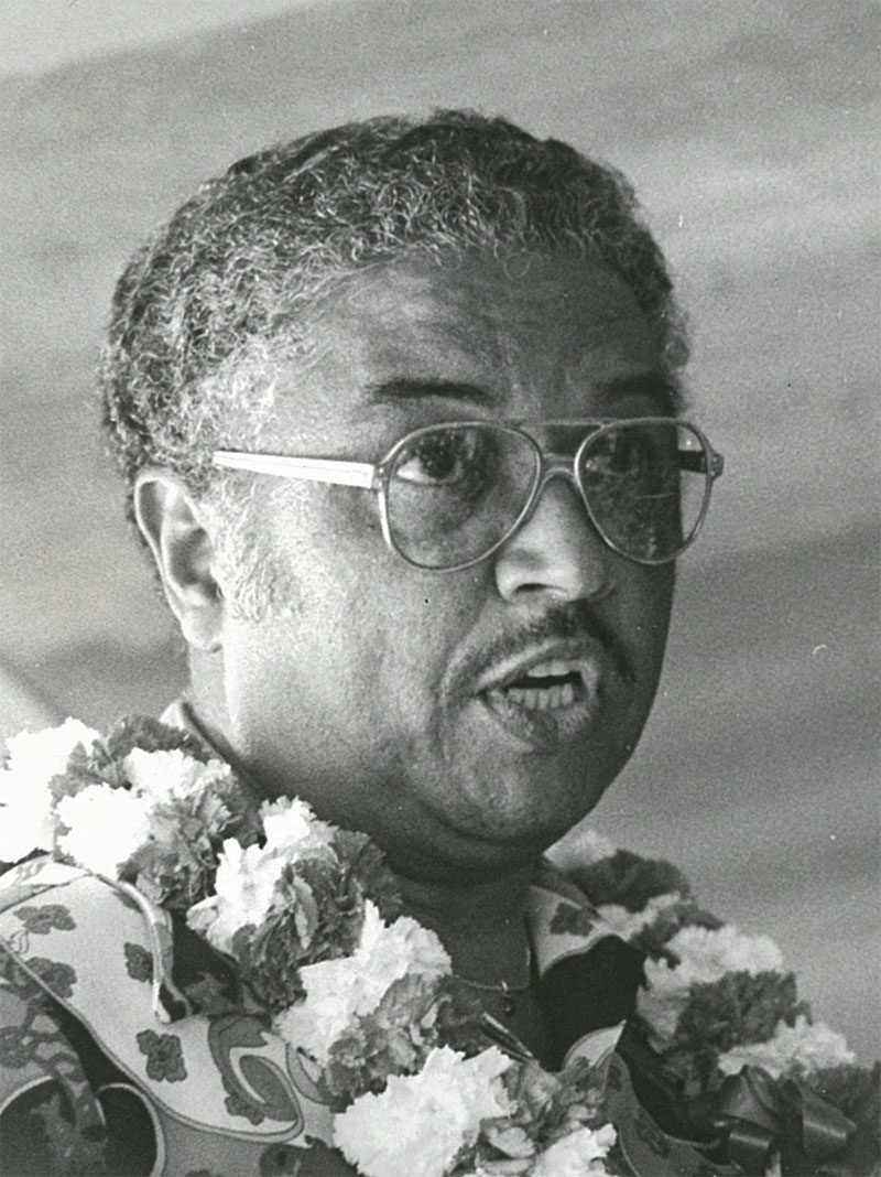 Leroy J. King wearing a double carnation lei